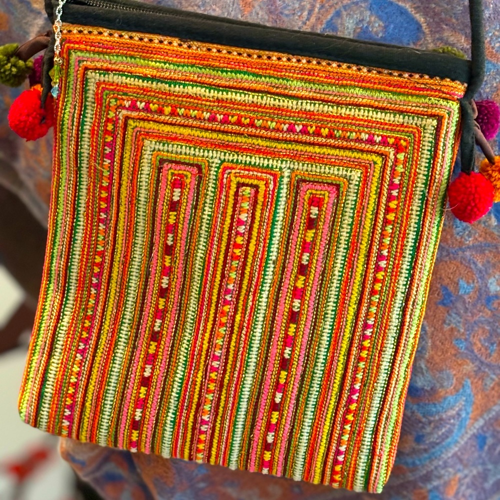 Handmade cross body Guatemalan-style fabric purse.